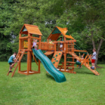 Gorilla Playsets Pioneer Peak Cedar Treehouse Swing Set with Clatter Bridge and Tire Swing